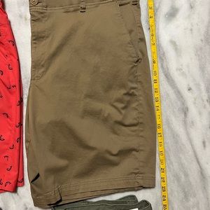 Lot of men’s shorts 2 XL and size 42 lined swim trunks all new without tags.